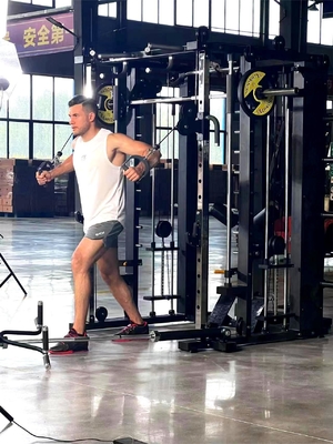 Krafttraining Multifunktions-Smith-Maschine mit Schwerpunkt-Kabel-Crossover-Maschine
